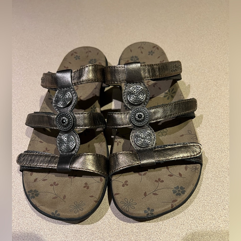 Gently worn taos sandals, size 7